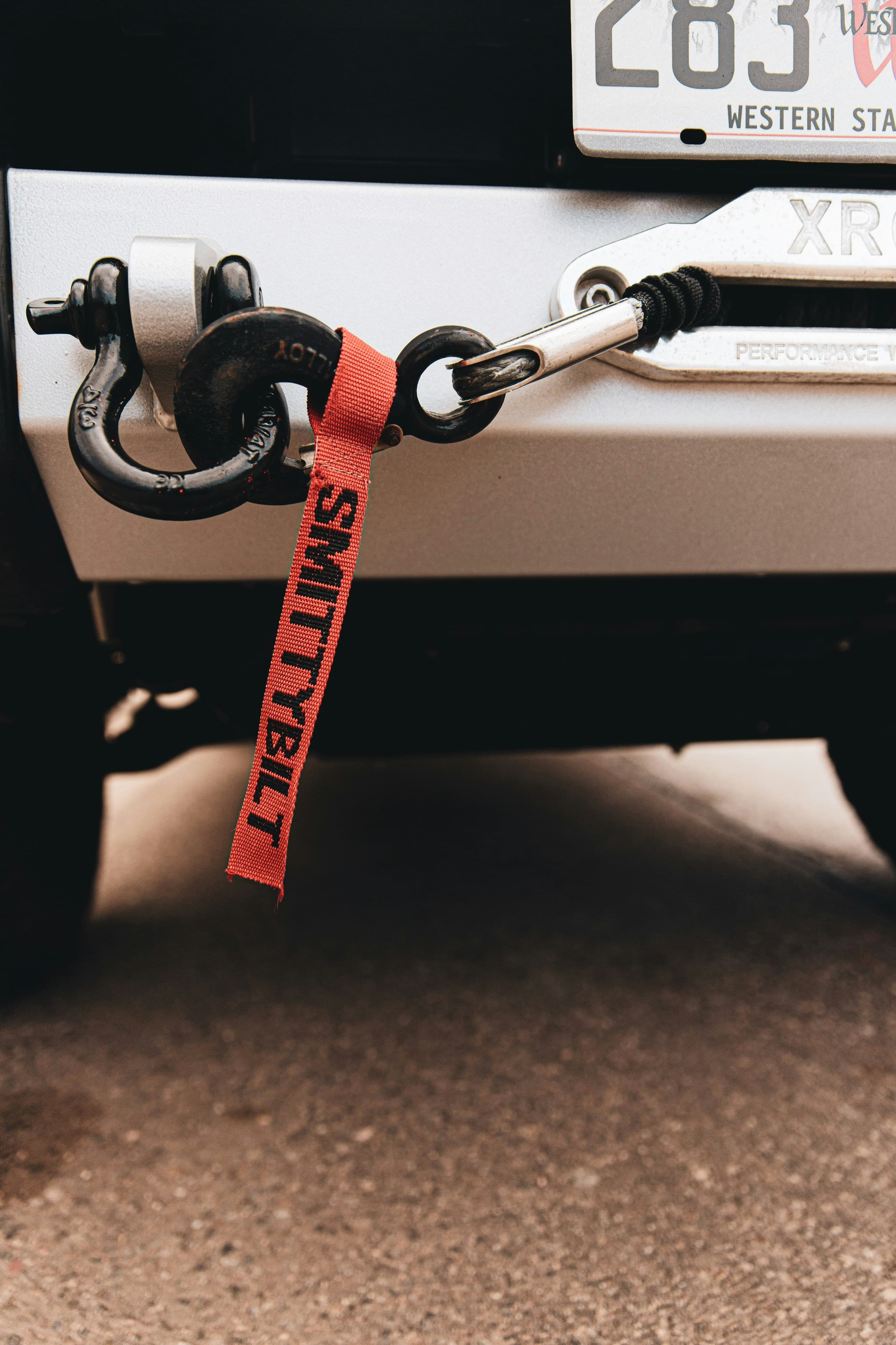 Tow chain attached to a vehicle
