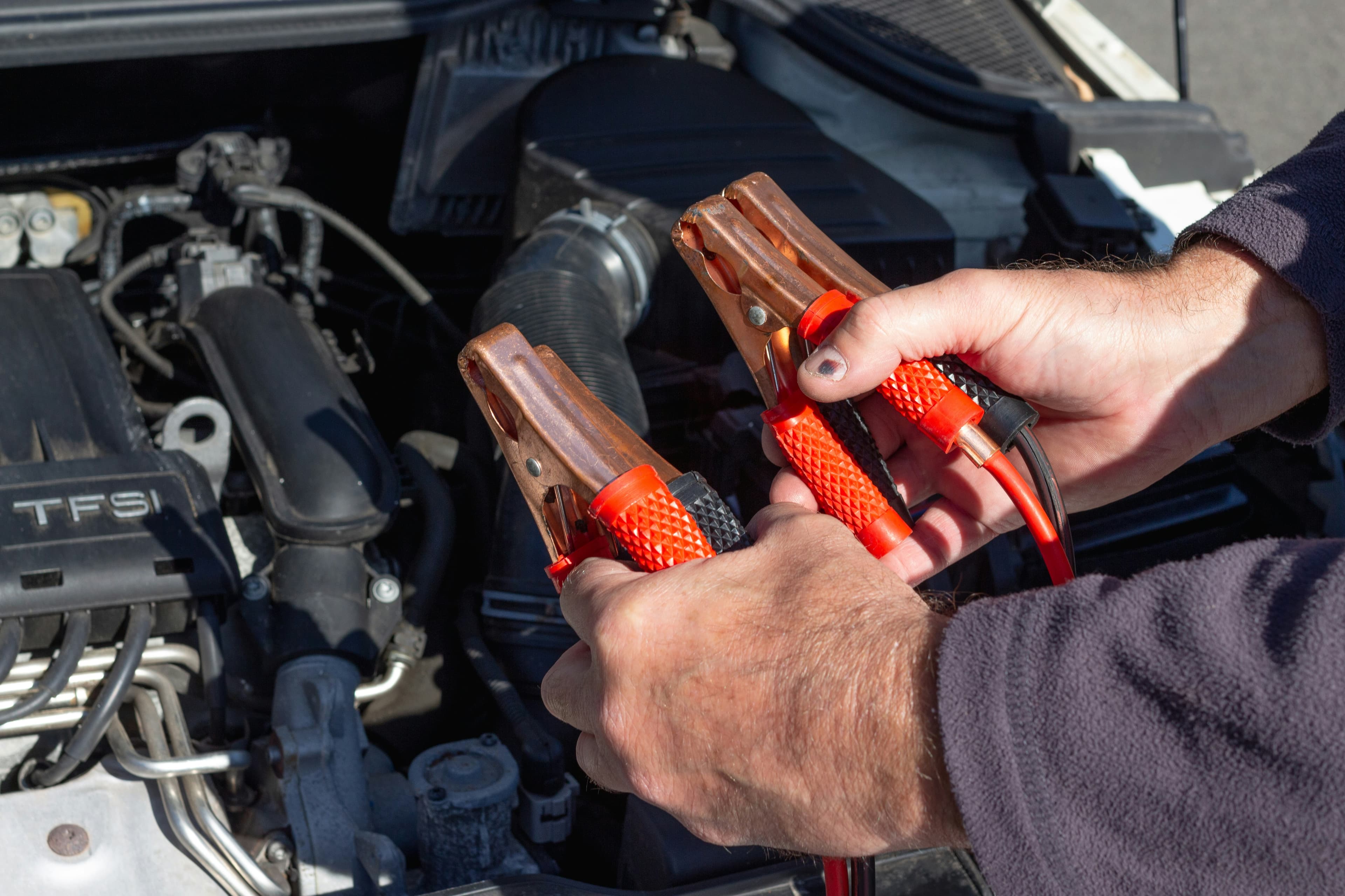 Jumper cable clamps for a vehicle jump start