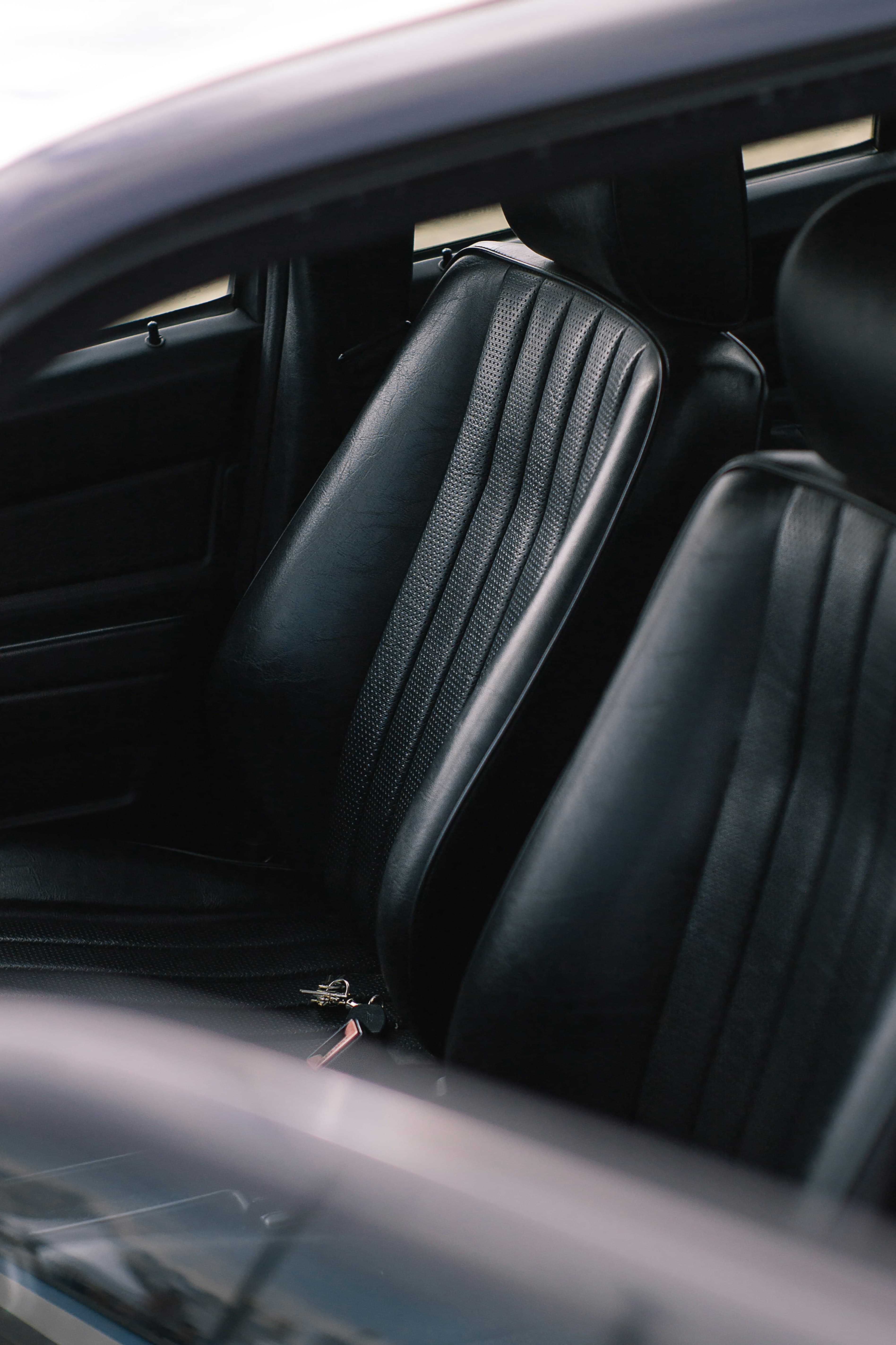 Vehicle keys beside the driver seat